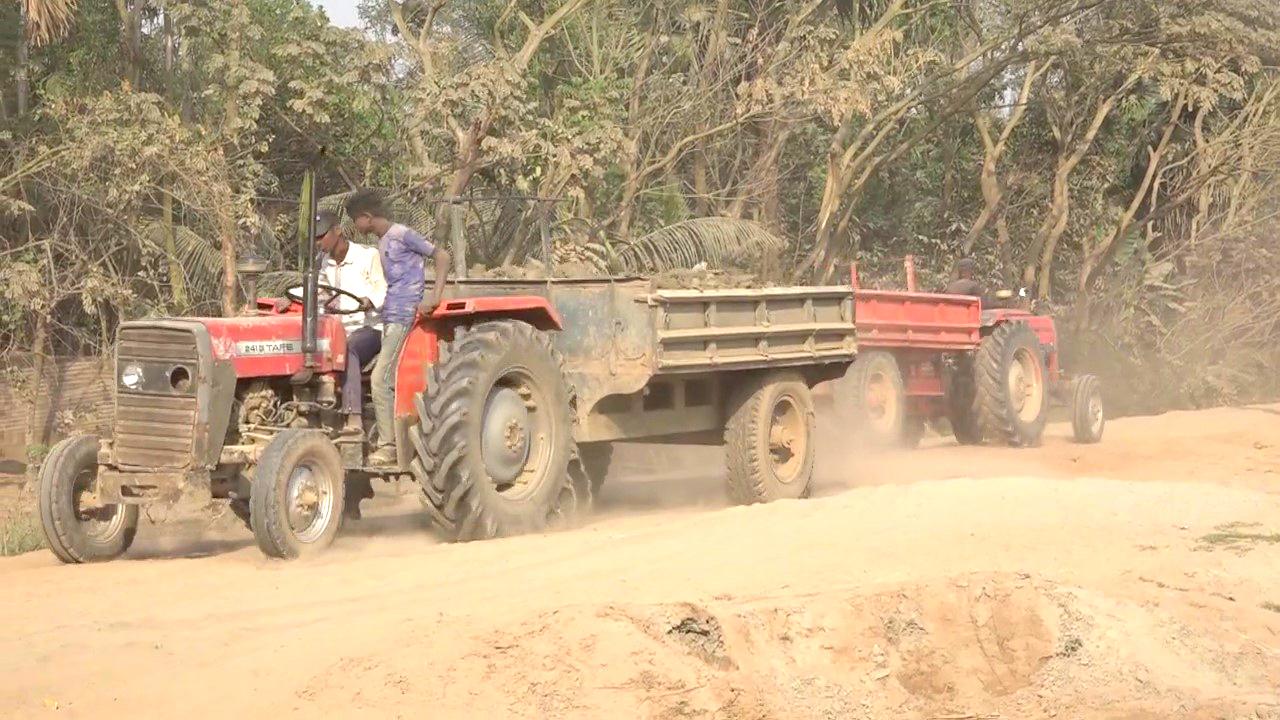 উন্নয়ন নষ্ট অবৈধ ট্রাক্টরে